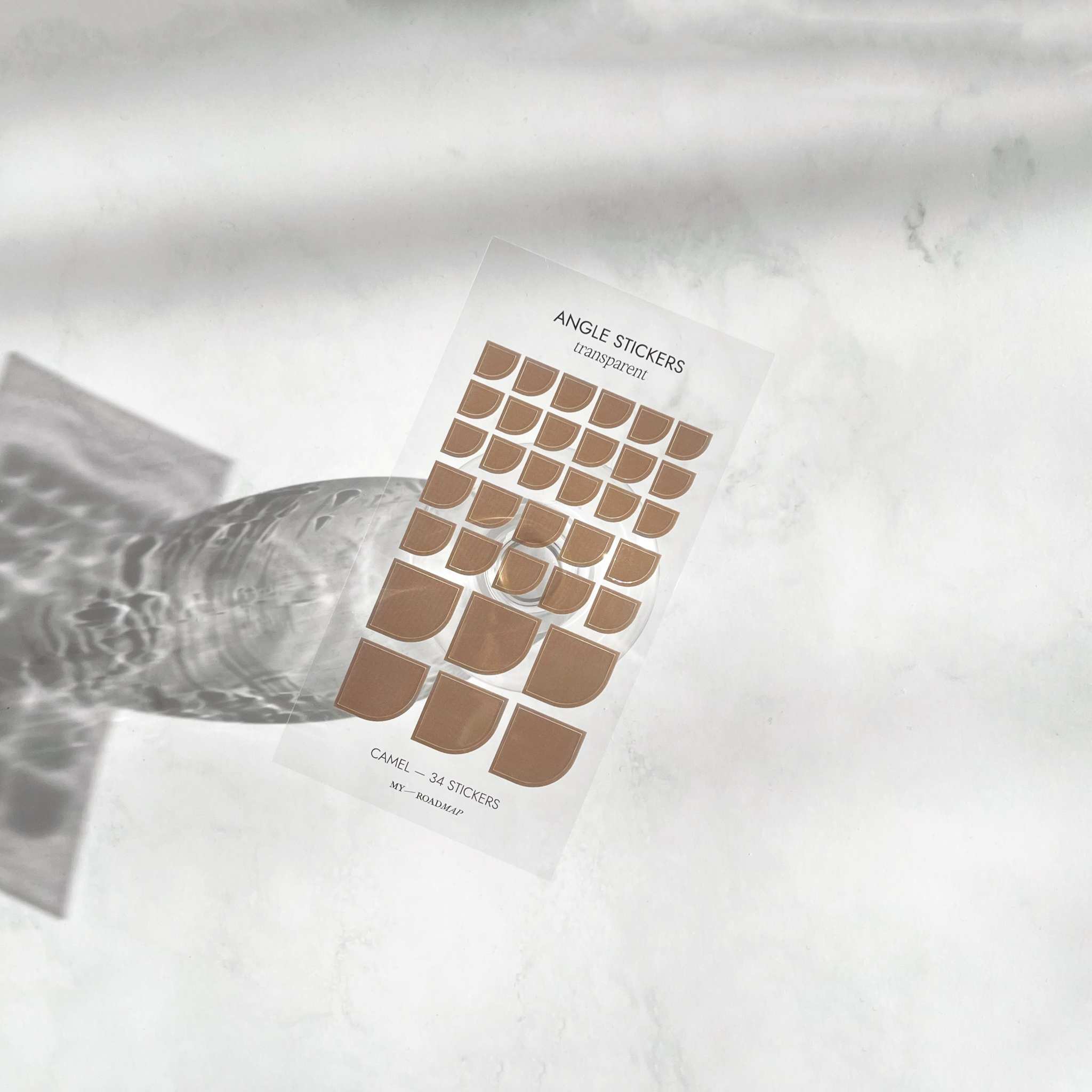 Transparente Planer-Stickers in verschiedenen Größen auf klarem Bogen zur Markierung wichtiger Ereignisse im Journal