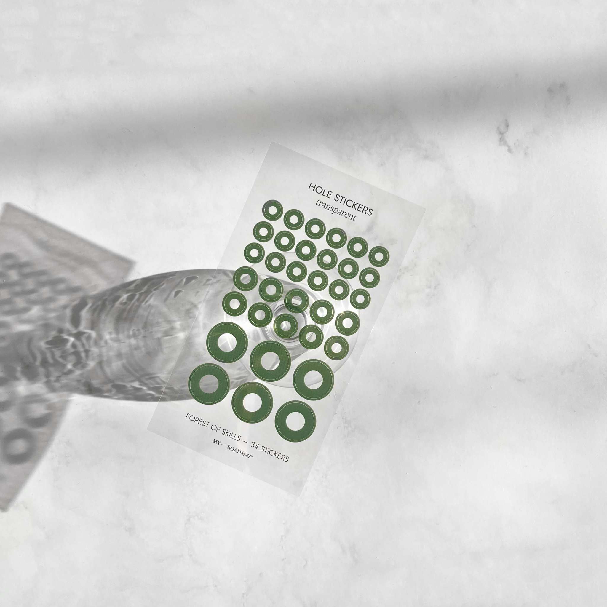 Transparente Planer-Stickers in drei Größen als gelochte Kreise auf klarem Bogen zur Markierung im Planer oder Bullet Journal